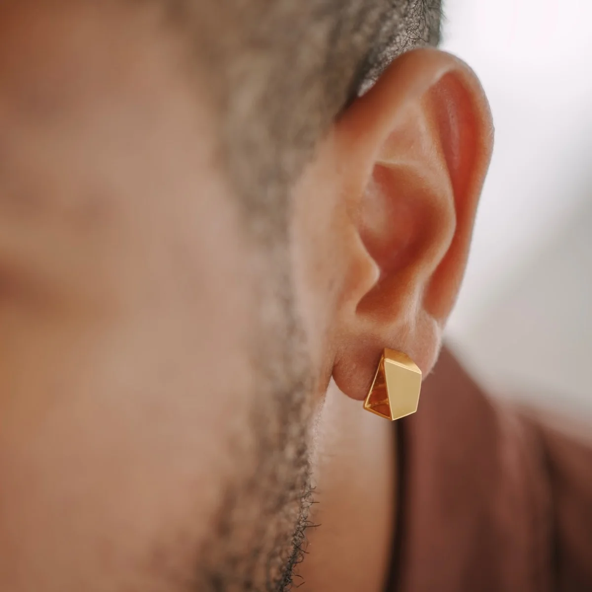 boucles d'oreilles artisanales pour homme dorées
