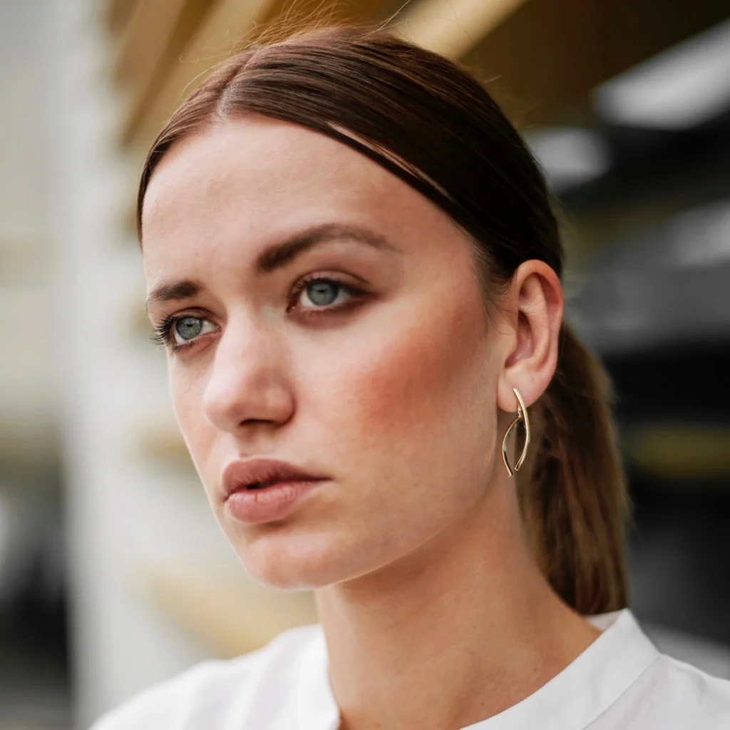 boucles d'oreilles dorées créateur