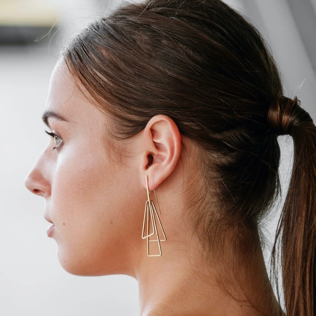 boucles d'oreilles longues dorées